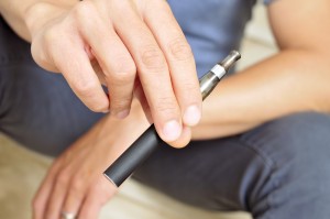 young man vaping marijuana